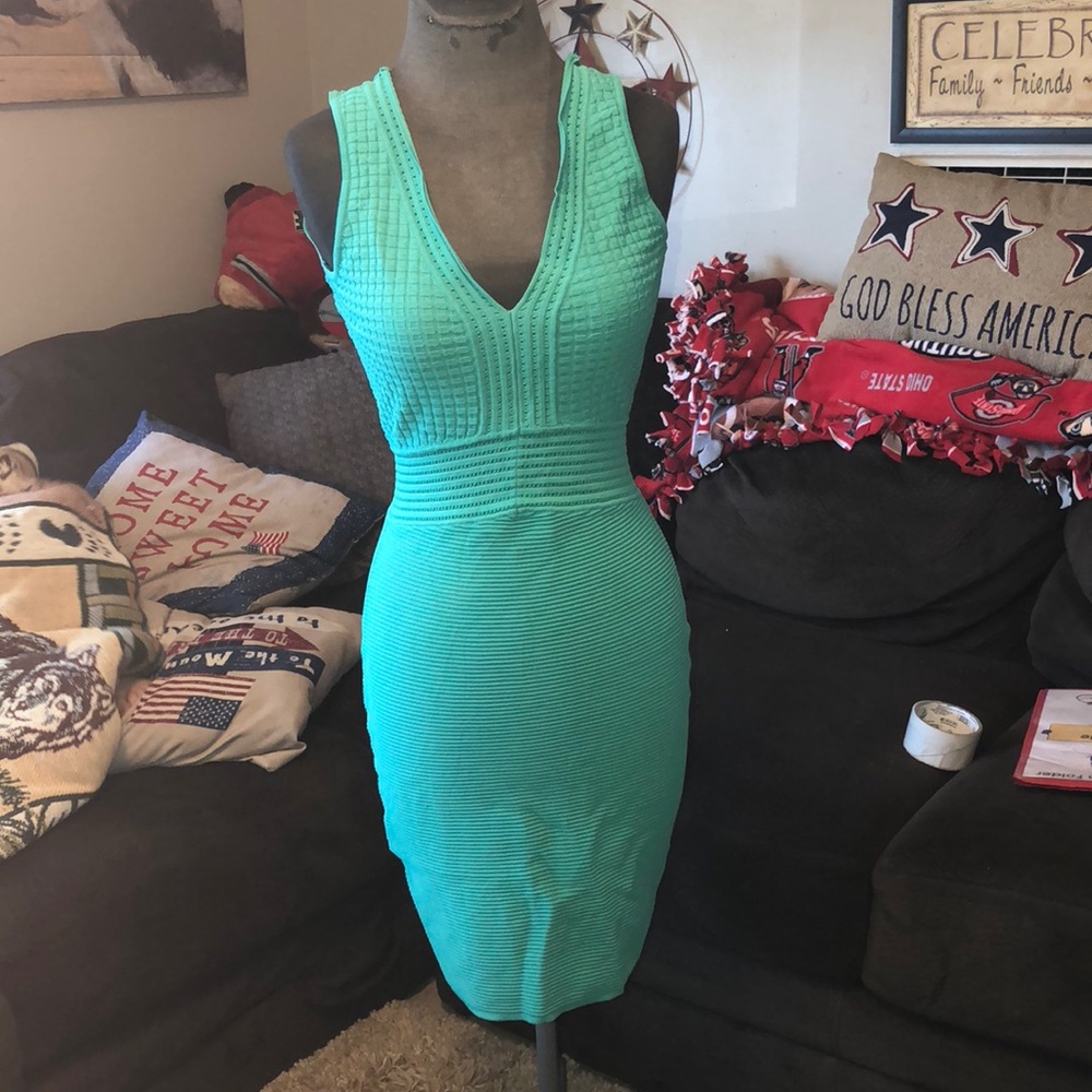 GORGEOUS green body con dress